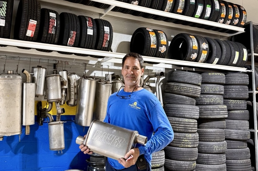 ernie holding custom exhaust equipment